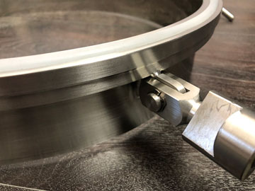 Glass manhole cover clamp